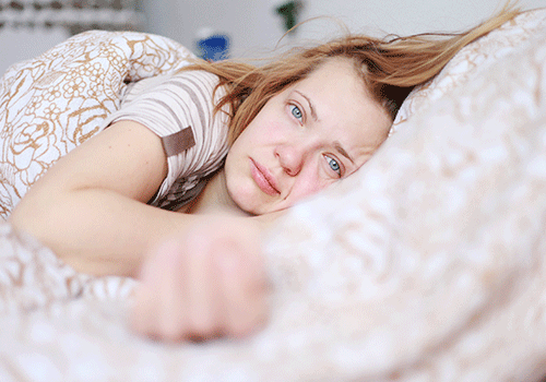 woman with insomnia in need of sleep apnea